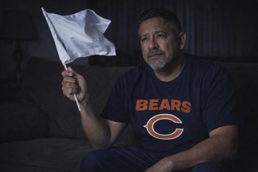 Illustrated trophy of a 50-year old male throwing up the white flag in the face of defeat of a Bears game.