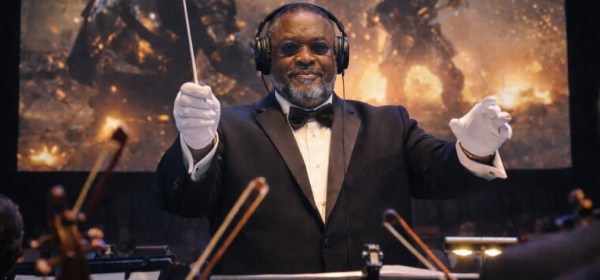 Illustrated scene of a Black man, conducting a musical score for a motion picture.